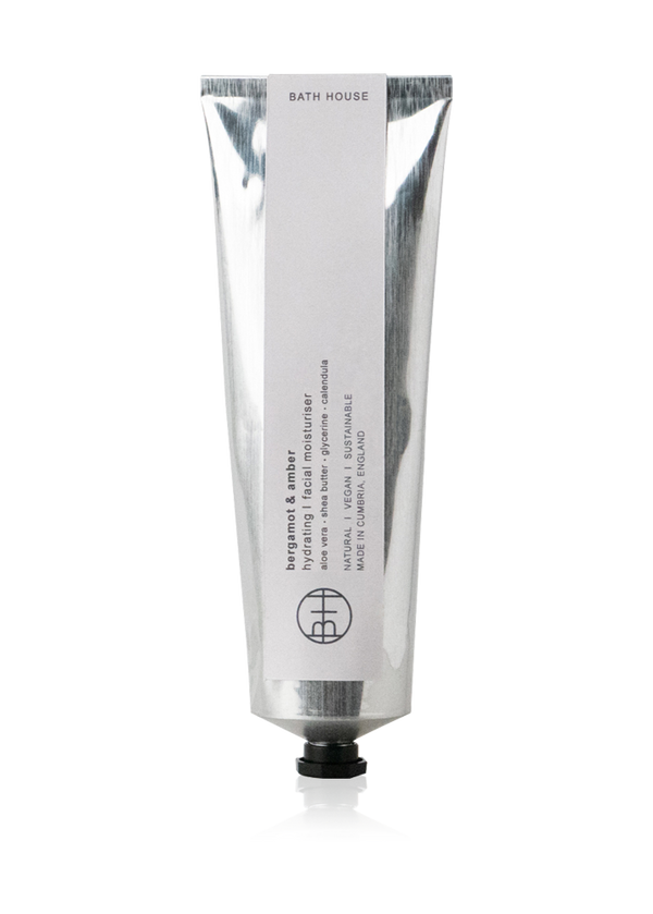 Hand cream tube with brand logo on a white background
