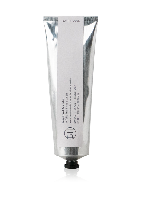 Hand cream tube with brand logo on a white background