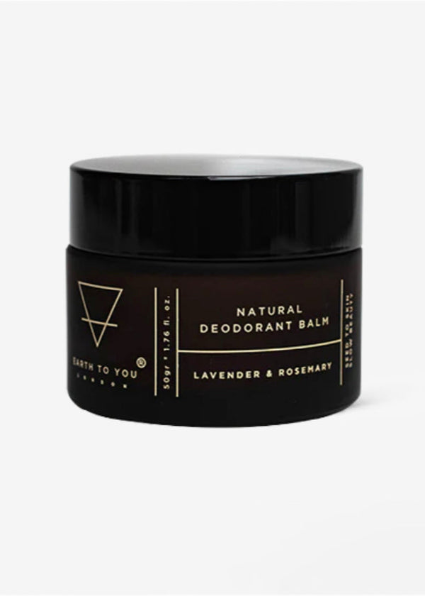 Black deodorant balm jar with branding on a white background