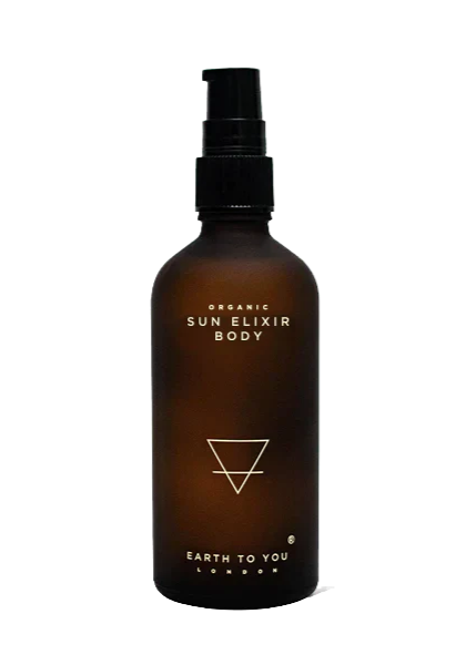 A brown glass bottle with a black cap and a label that reads 'Sun Elixir Body Earth to You'.