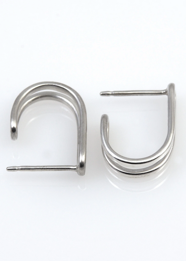 Silver hoop earrings on a white background