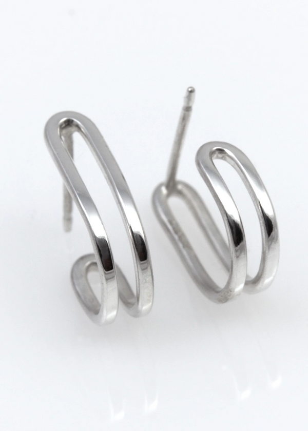 Silver hoop earrings on a white background