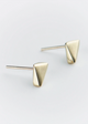 Gold triangle-shaped earrings on a light gray background