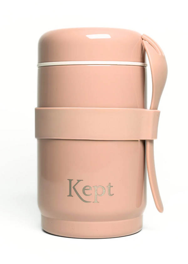 Pink thermos with a handle on a white background