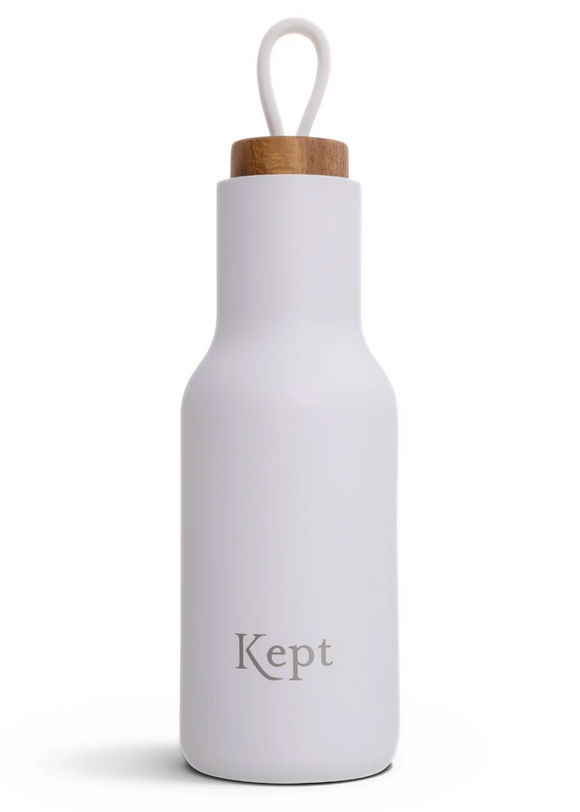 White water bottle with a wooden cap on a white background