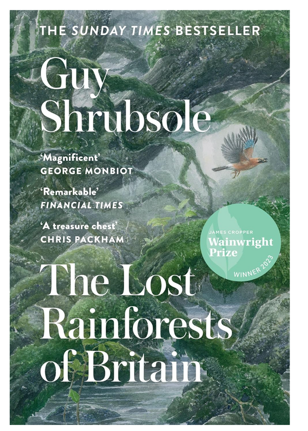This image features the cover of "The Lost Rainforests of Britain," a book by Guy Shrubsole. The cover displays a lush, green landscape with trees and a bird in flight, emphasizing the theme of rainforests and nature.