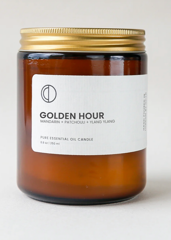 octo golden hour candle in an amber glass jar