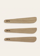 Three wooden spatulas with 'Fryth' branding on a beige background
