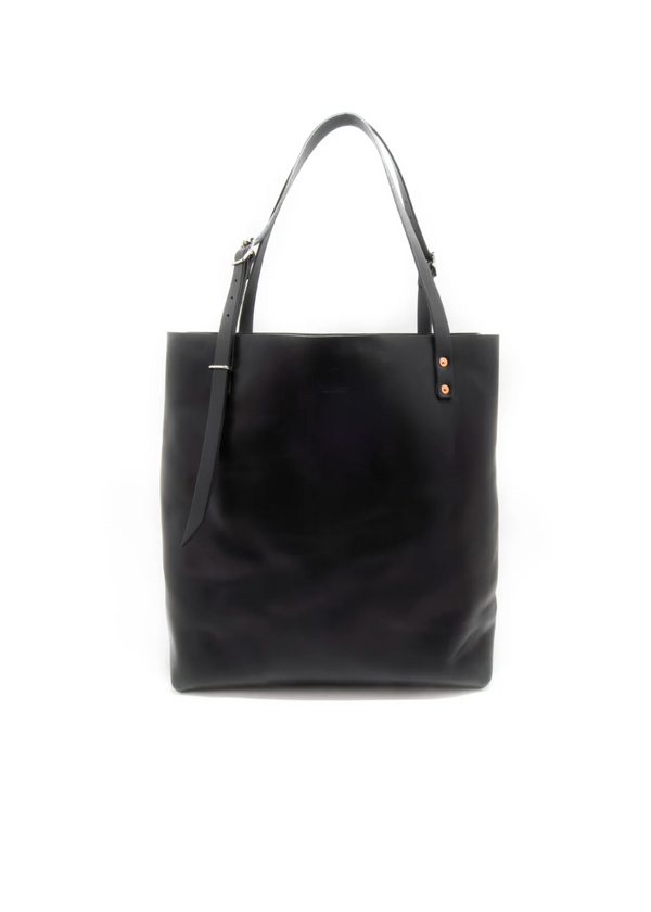 Black handbag with a strap on a white background
