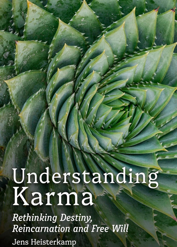 Book cover of 'Understanding Karma' with succulent plant background