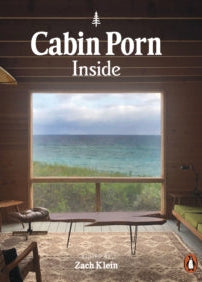 Book cover of 'Cabin Porn Inside' with a view of a room with a large window overlooking water.