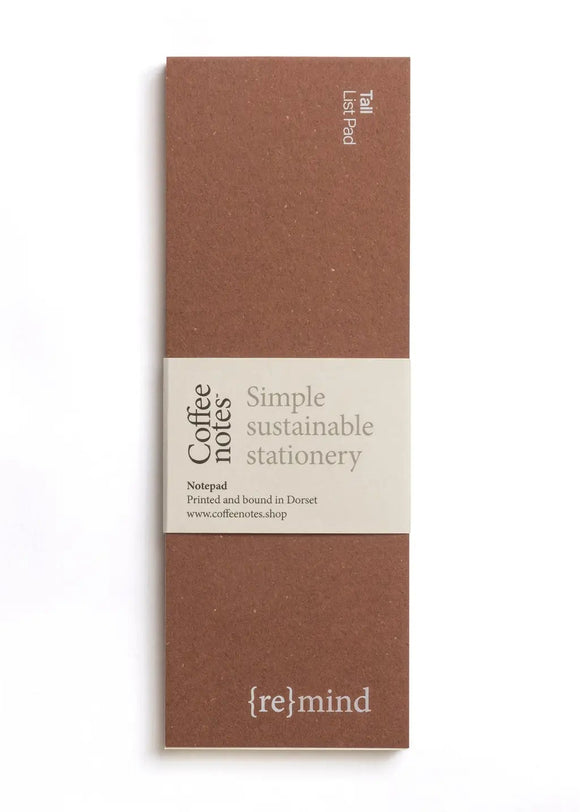 Brown notebook with 're{mind}' branding on a white background