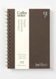 Spiral-bound notebook with 'Coffee notes' text on a white background