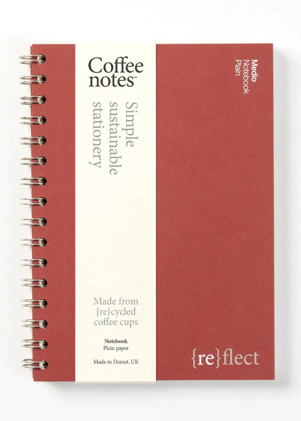 Red notebook with 'Coffee notes' and 'Simple sustainable stationery' text on a white background