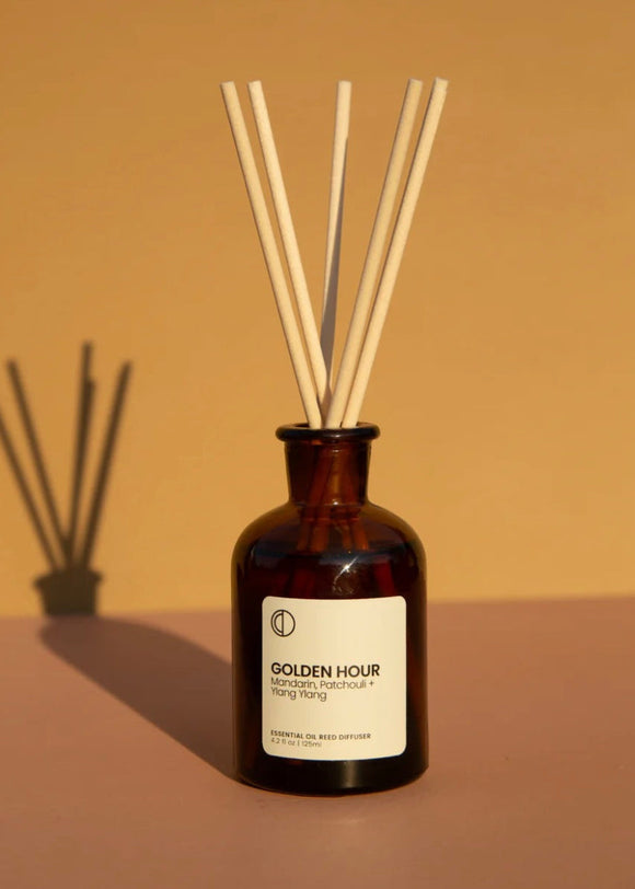 Octo golden hour reed diffuser in a brown glass bottle