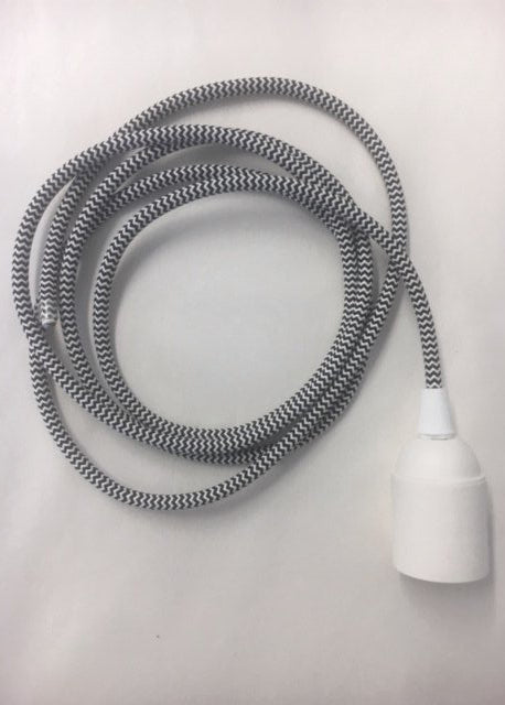 A coiled gray and white striped lamp cord with a white porcelain lamp holder at one end
