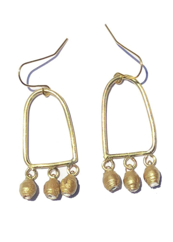 A pair of gold-tone earrings featuring a geometric shape with dangling beads, on a white background.
