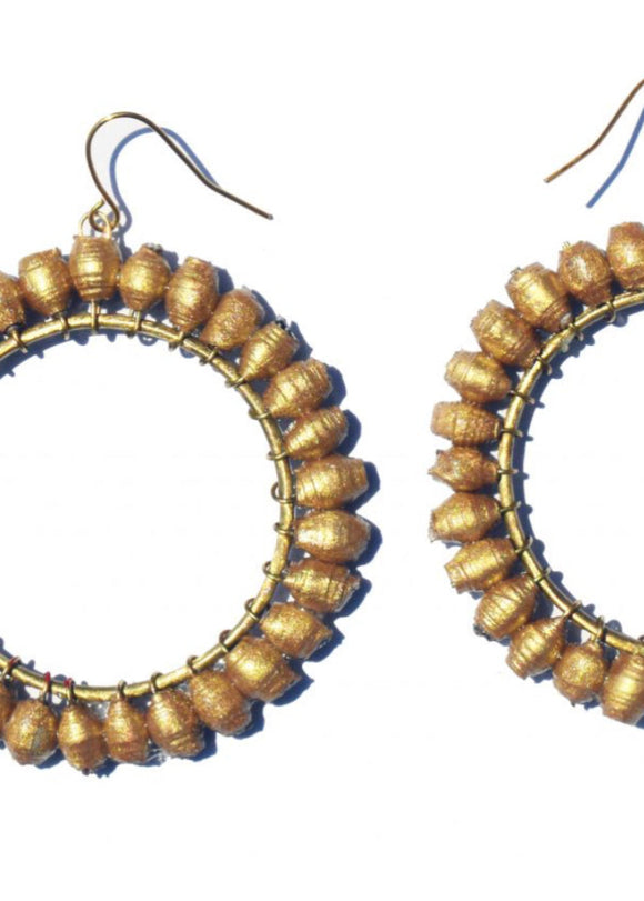 A pair of gold-colored hoop earrings with paper bead details, attached to brass rings and hooks.