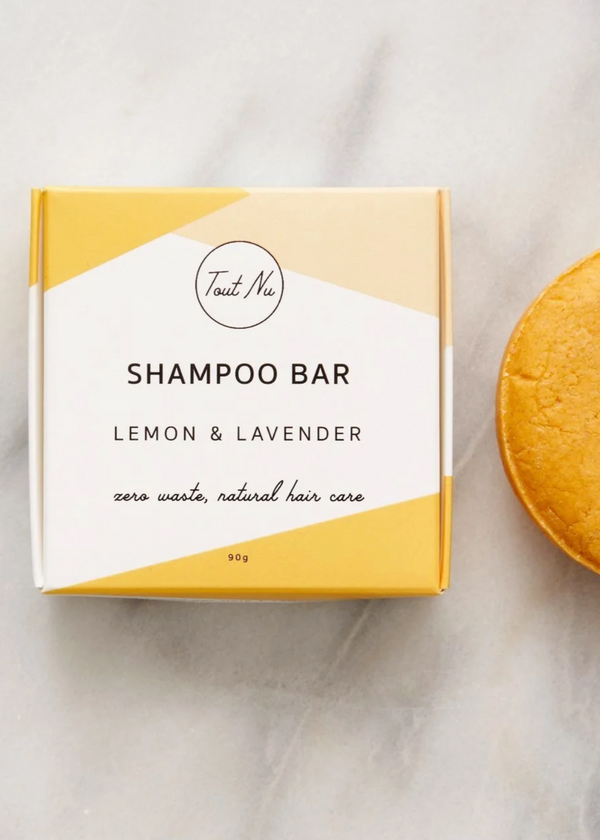 Shampoo bar and packaging with 'Taste Me' branding on a light background