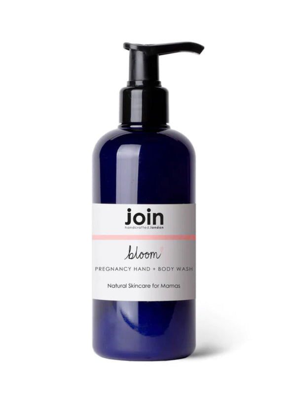 A pump bottle of Bloom hand and body wash by join, with a label that includes the brand name and product description.